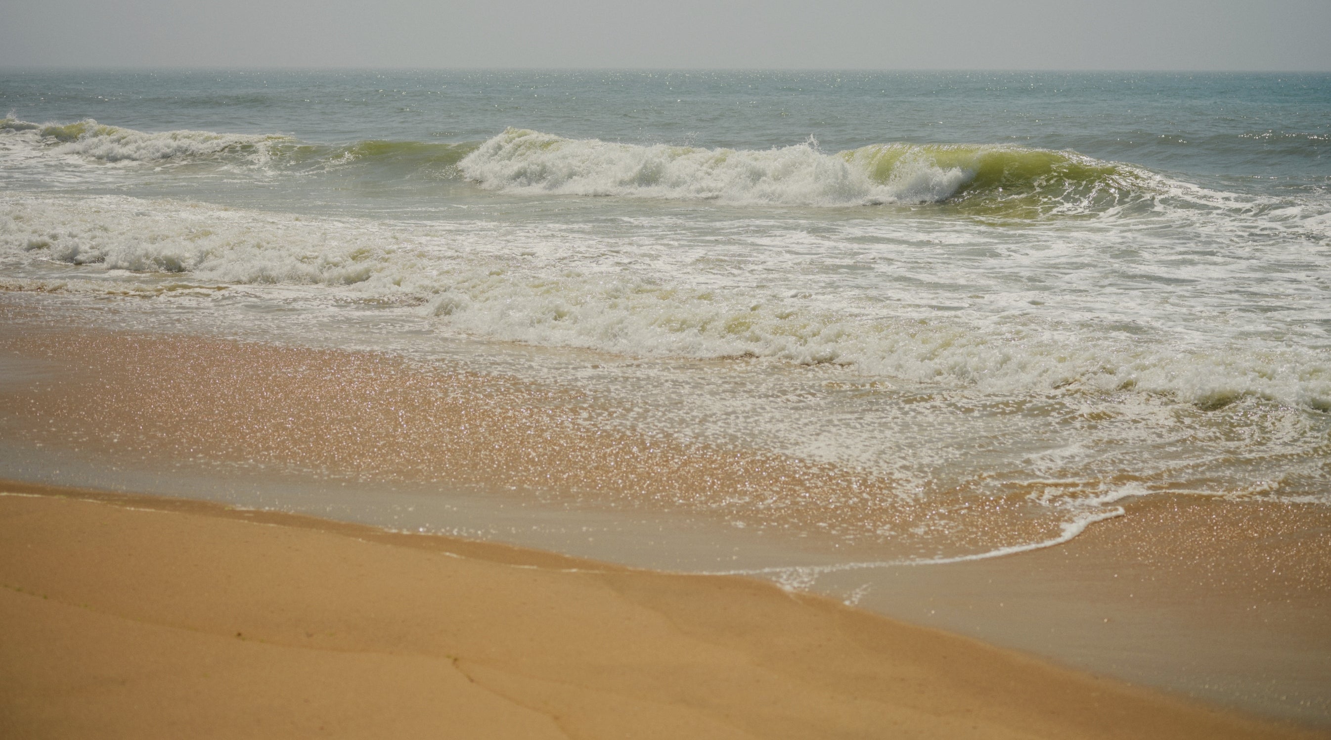 waves crashing on the beach