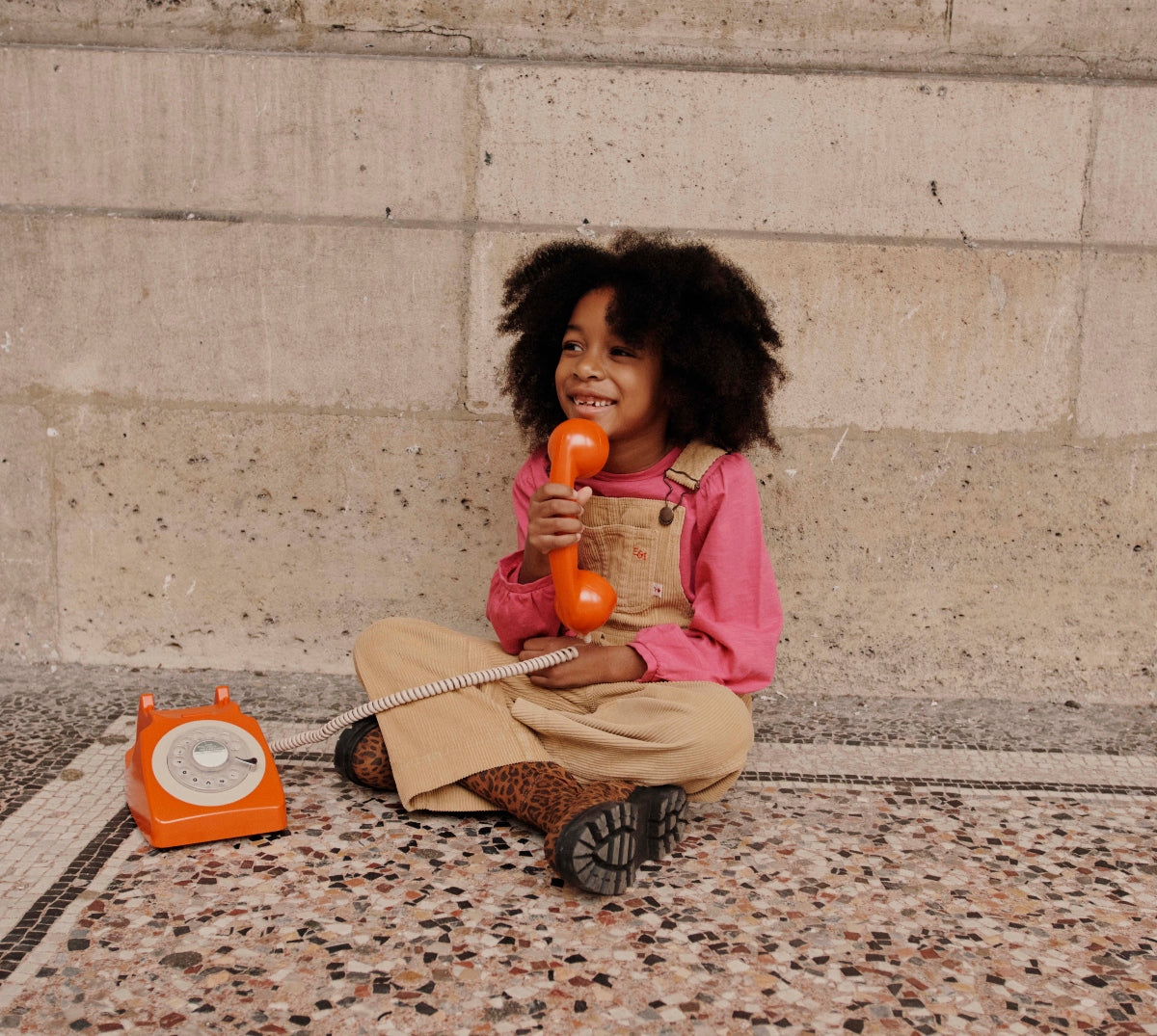 little girl with phone