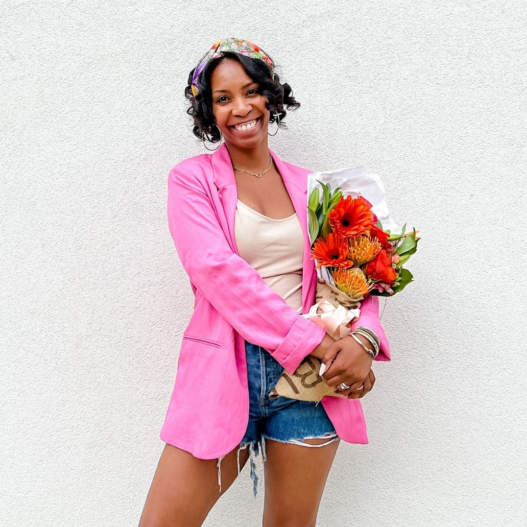 woman holding flower bouquet