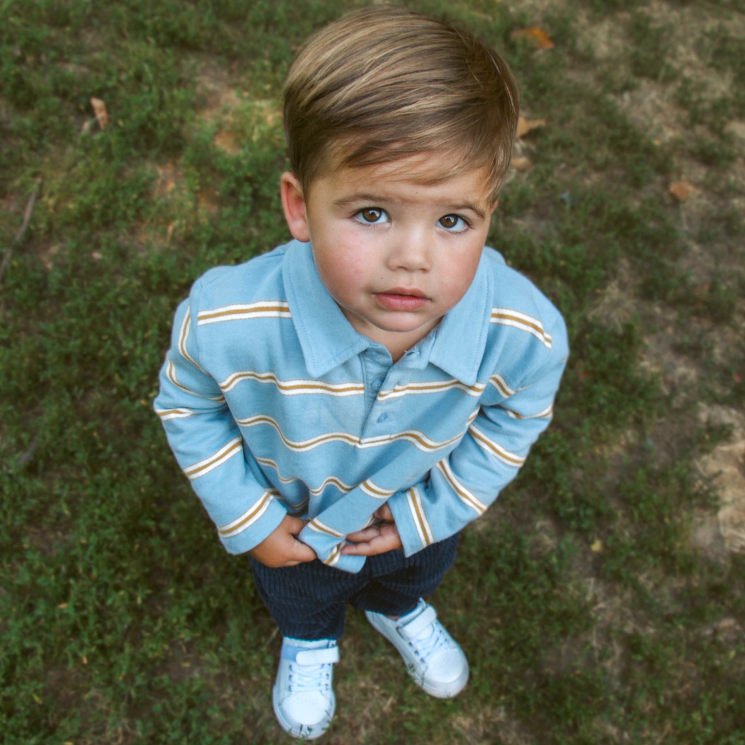 young boy wearing emile et ida polo