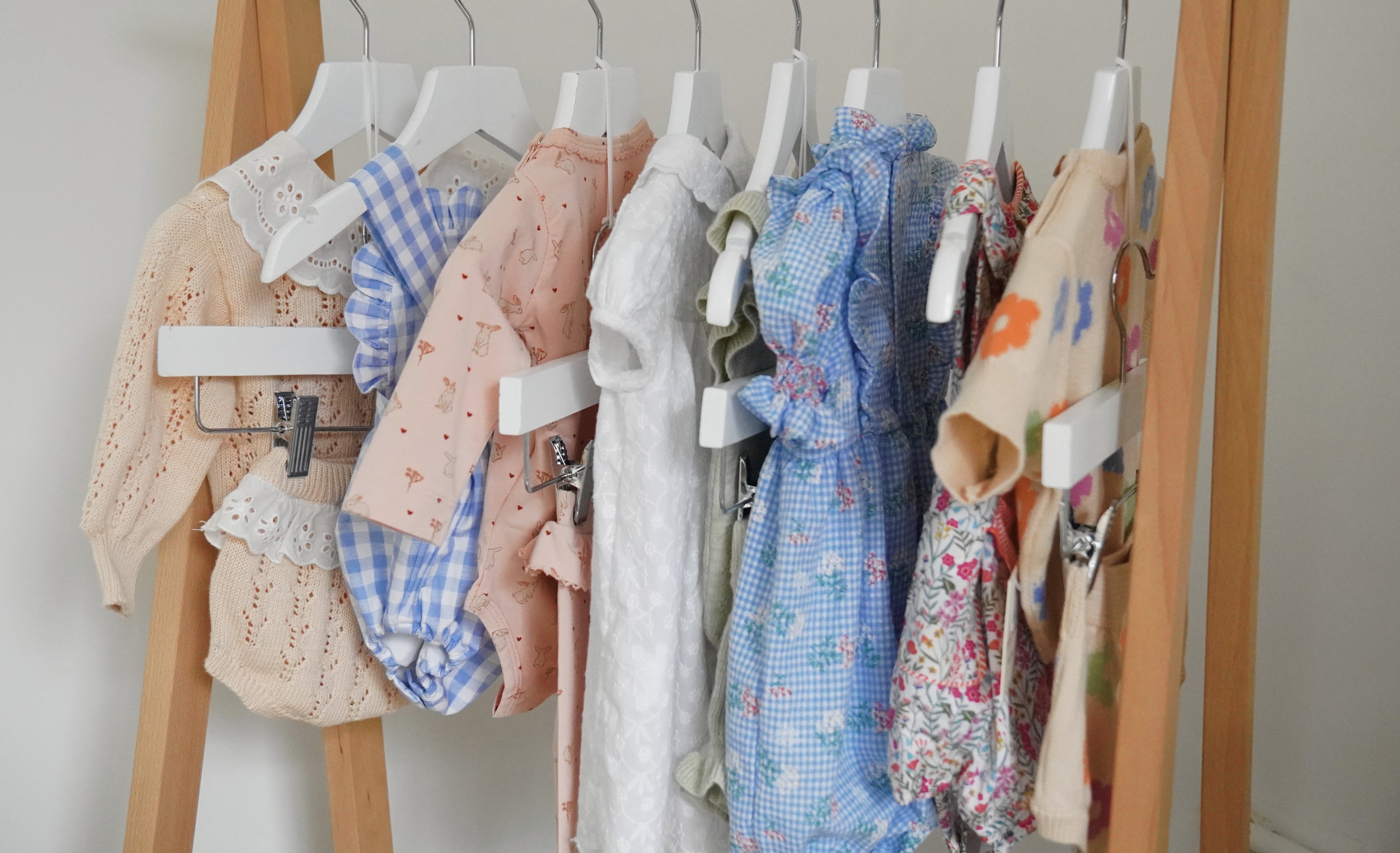 baby clothes on rack