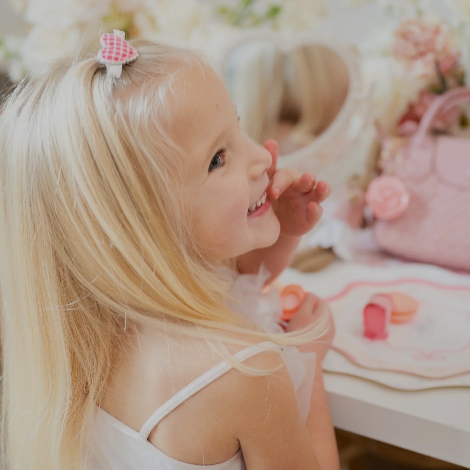 young girl wearing valentines day hair cllip