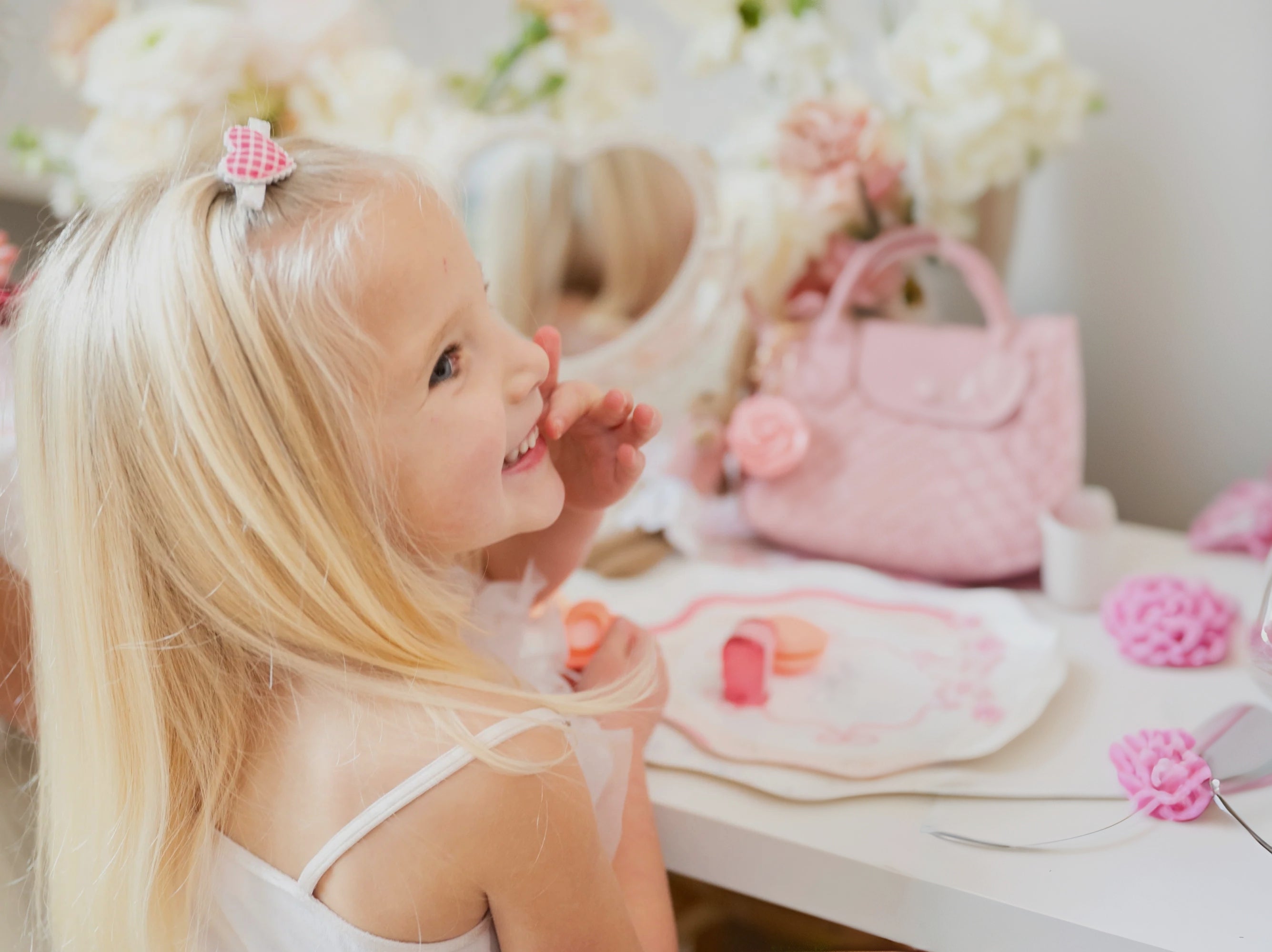 young girl wearing valentines day hair cllip