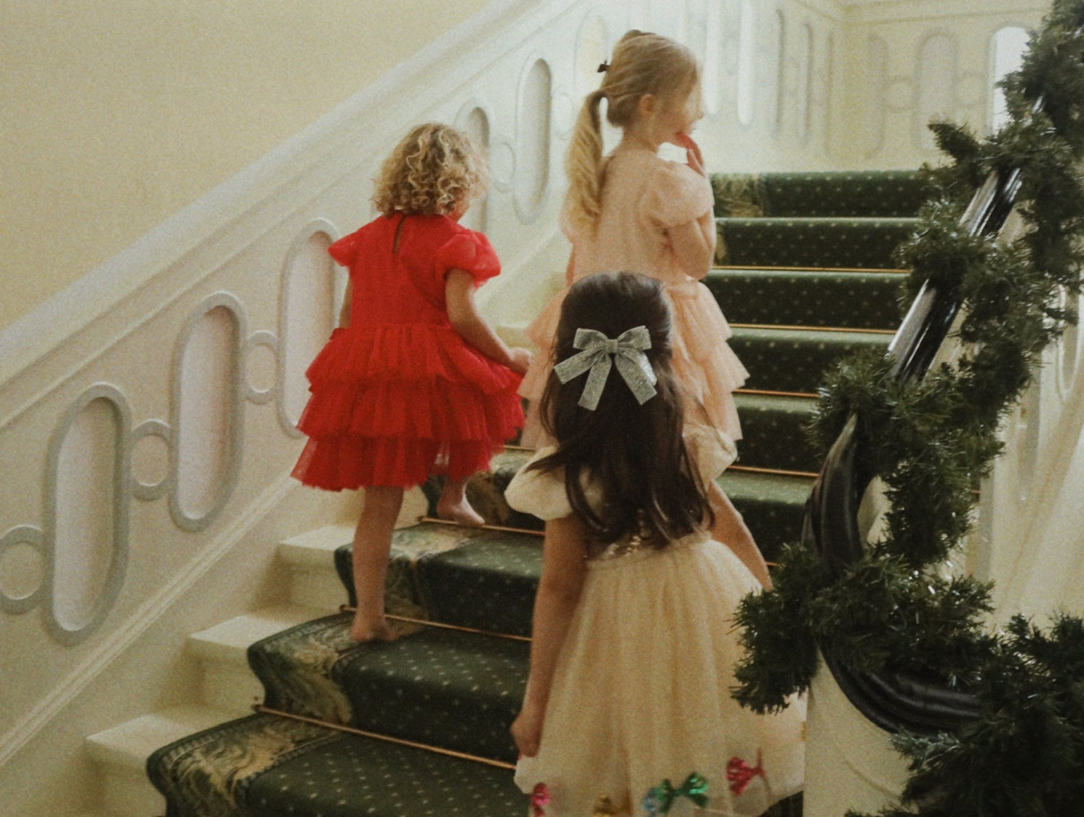 3 girls wearing konges slojd holiday dresses