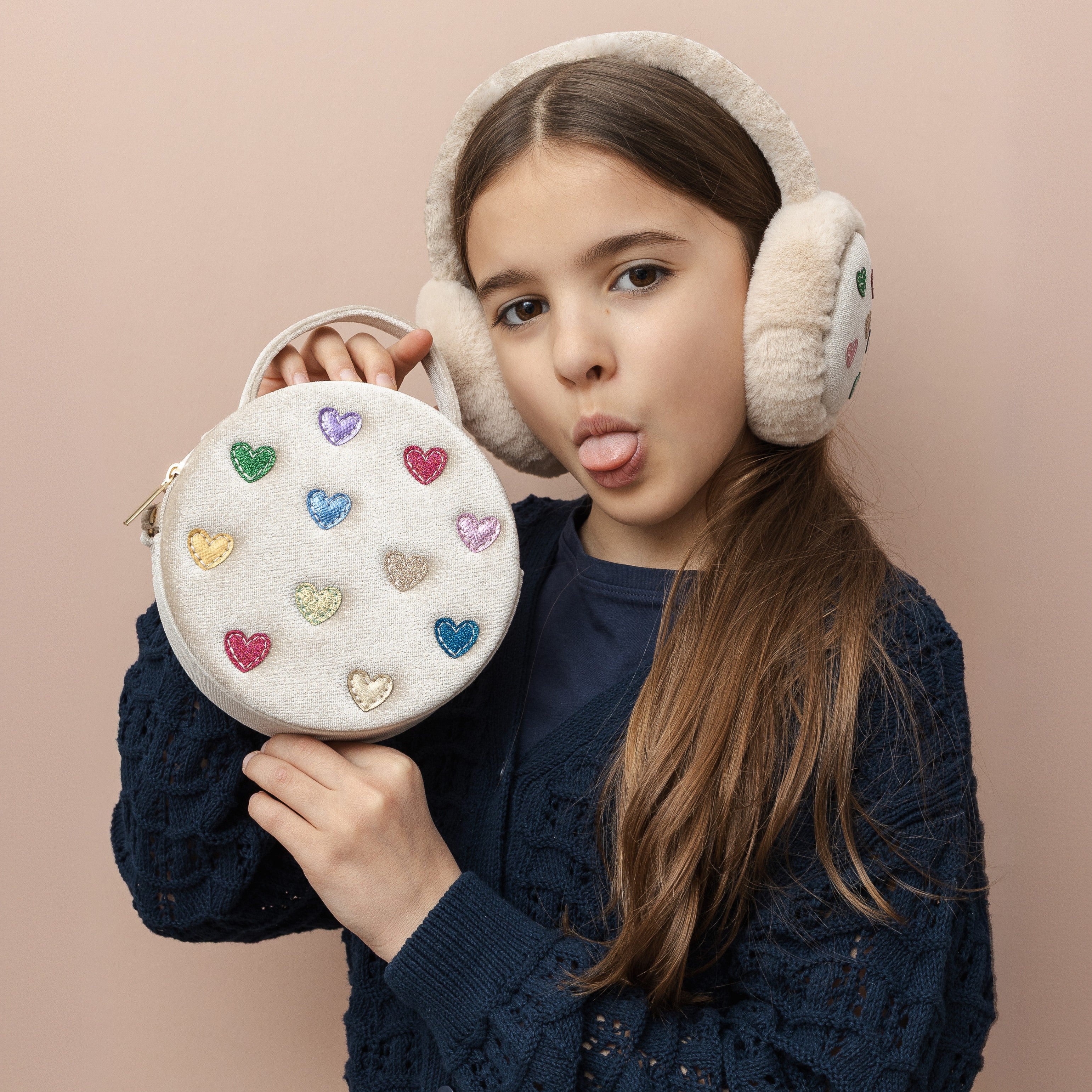 girl holding mimi & lula purse