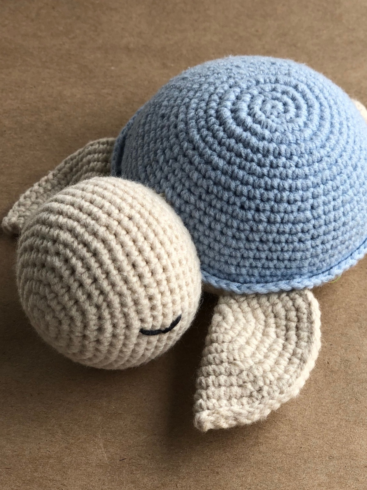 Hand outlets crocheted turtle