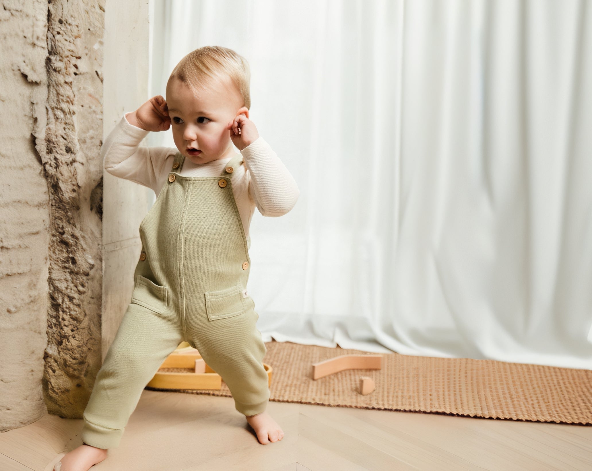 little boy in basic overall